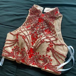 Sherri Hill size 0 very beautiful great condition. Draped back vibrant red